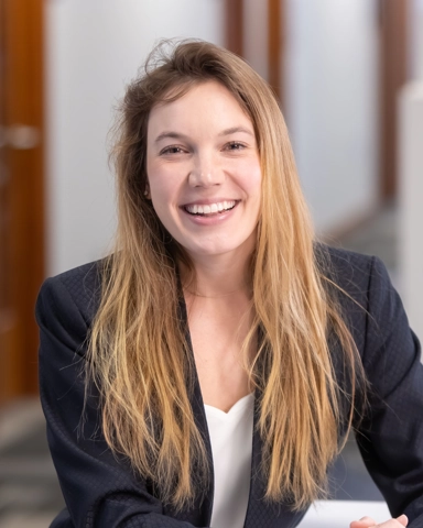 portrait of a smiling person in professional attire